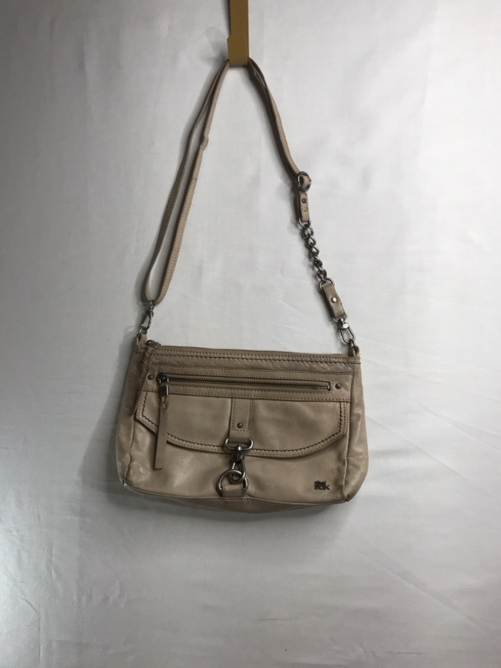 The Sak Beige Leather Crossbody with Chain Accent
